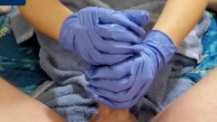 Coconut Oil Handy With Rubber Gloves Pov